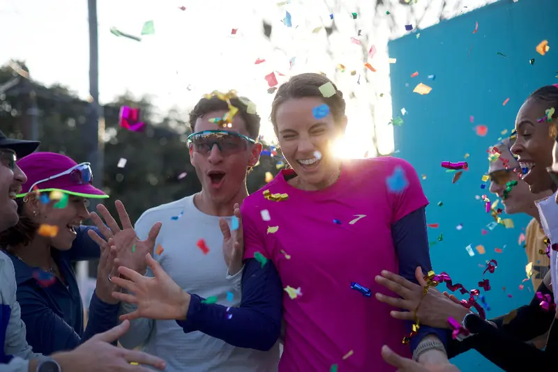 Friends cheering in a shower of confetti
